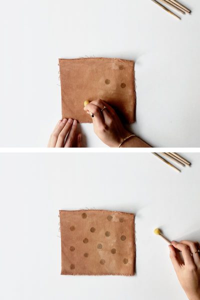 Patterns made with a single brush on plant-dyed fabric