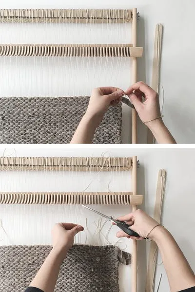 Cutting the rag rug off the loom