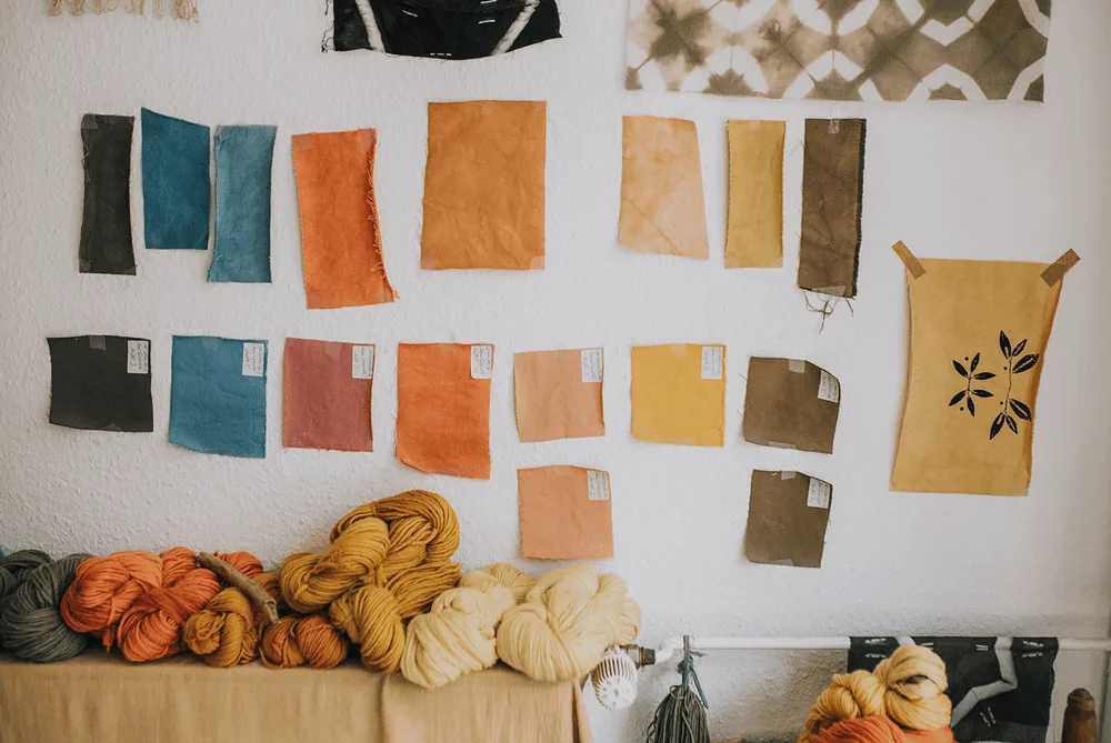 Natural dye color swatches showing 16 shades from three plant dyes